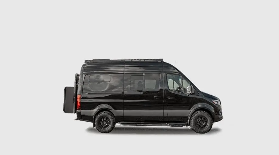 The Kinabalu in profile, a studio view of the black 144-inch high-roof body on all-terrain tyres