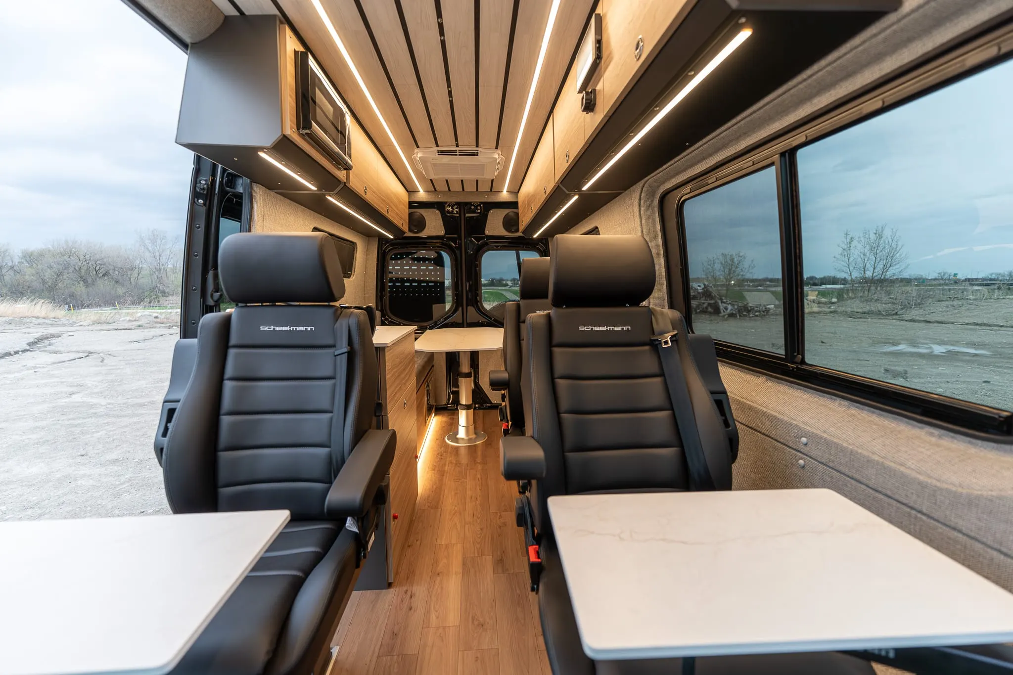 Kinabalu rear dinette with a table beside a large side window