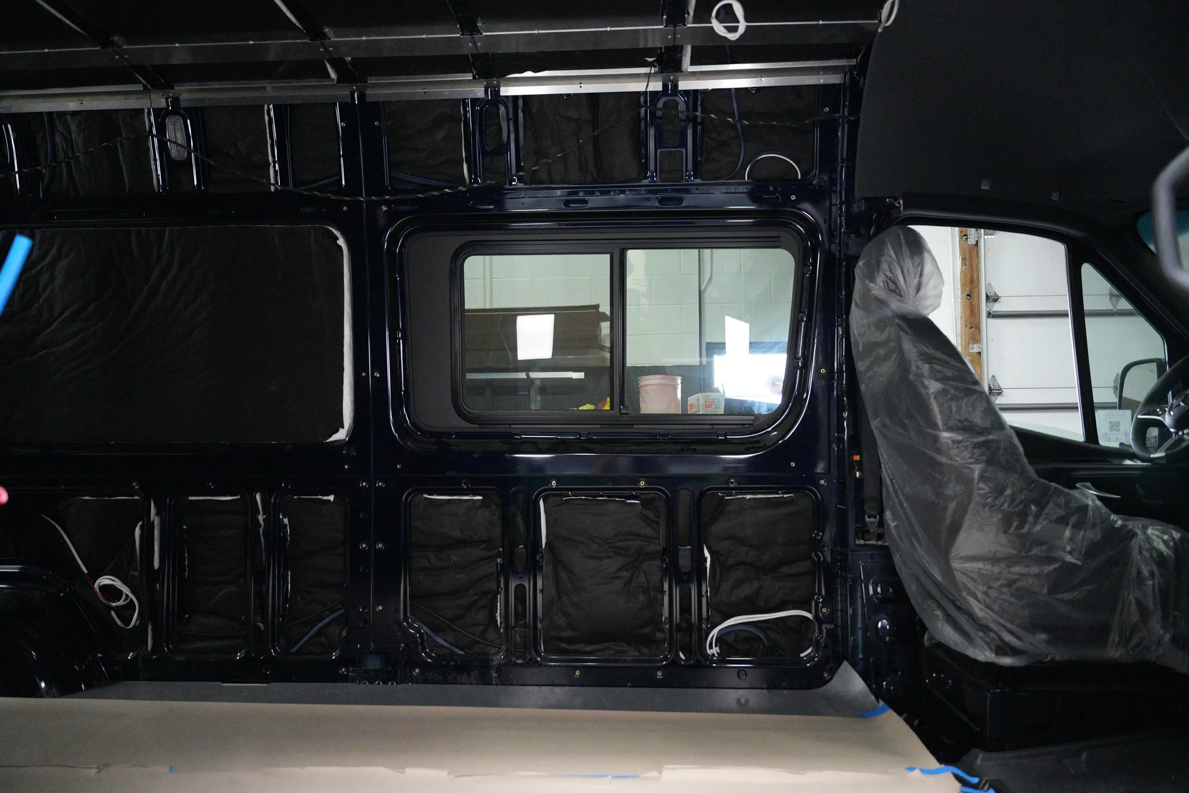 Installing 3M Thinsulate and Aerogel camper van insulation in a Mercedes Sprinter