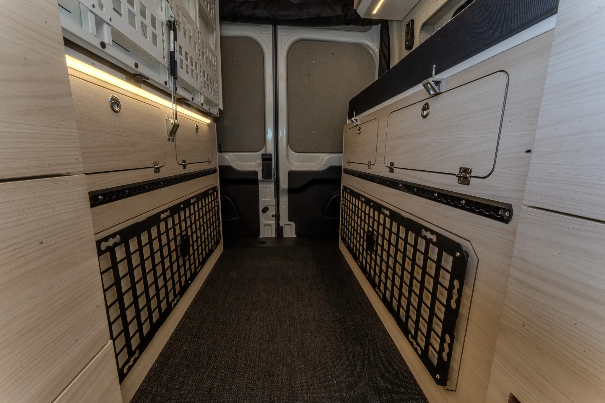The aisle looking to the rear with the bed folded up