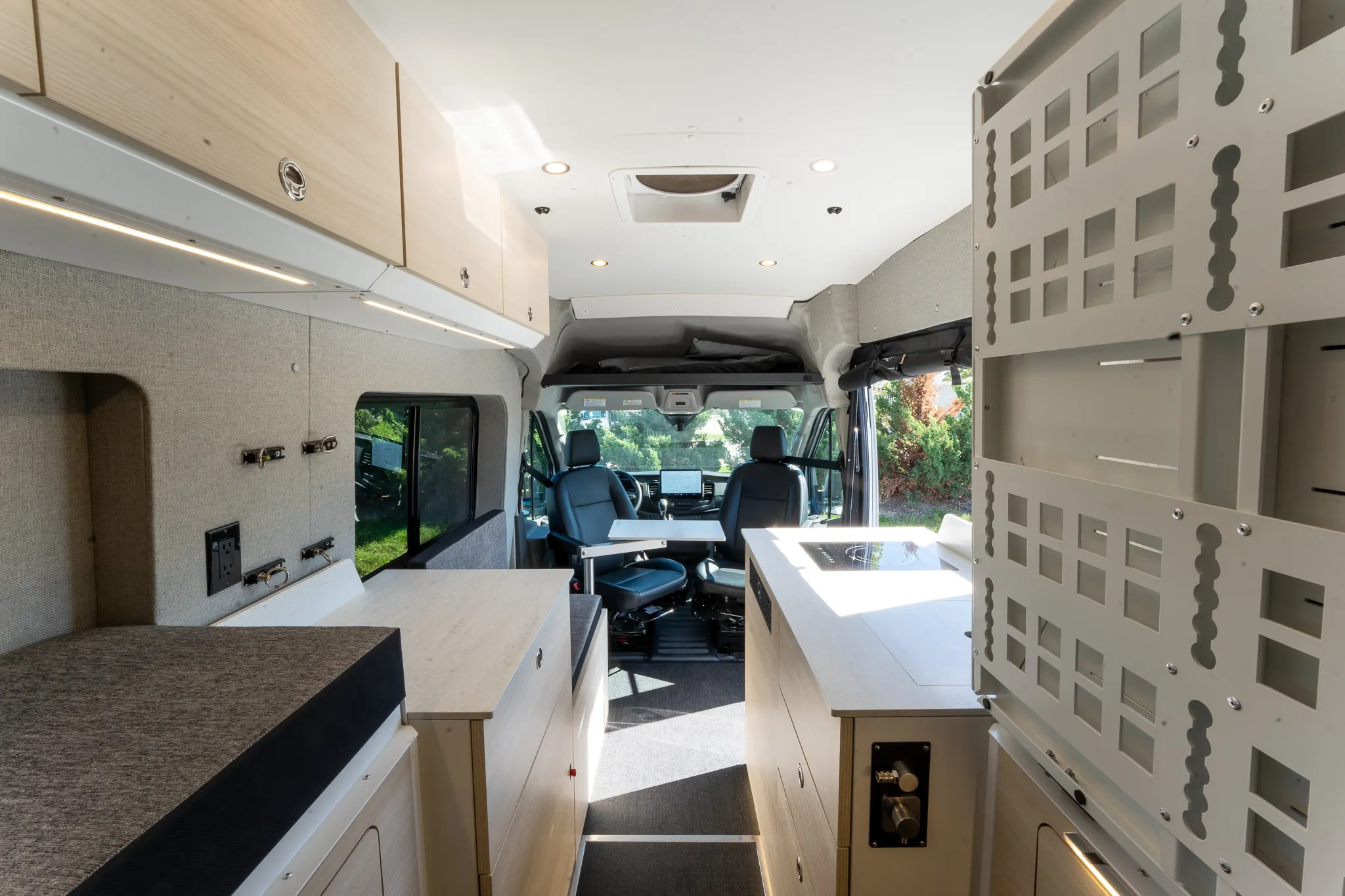 The interior looking forward with the Murphy bed folded up against the wall