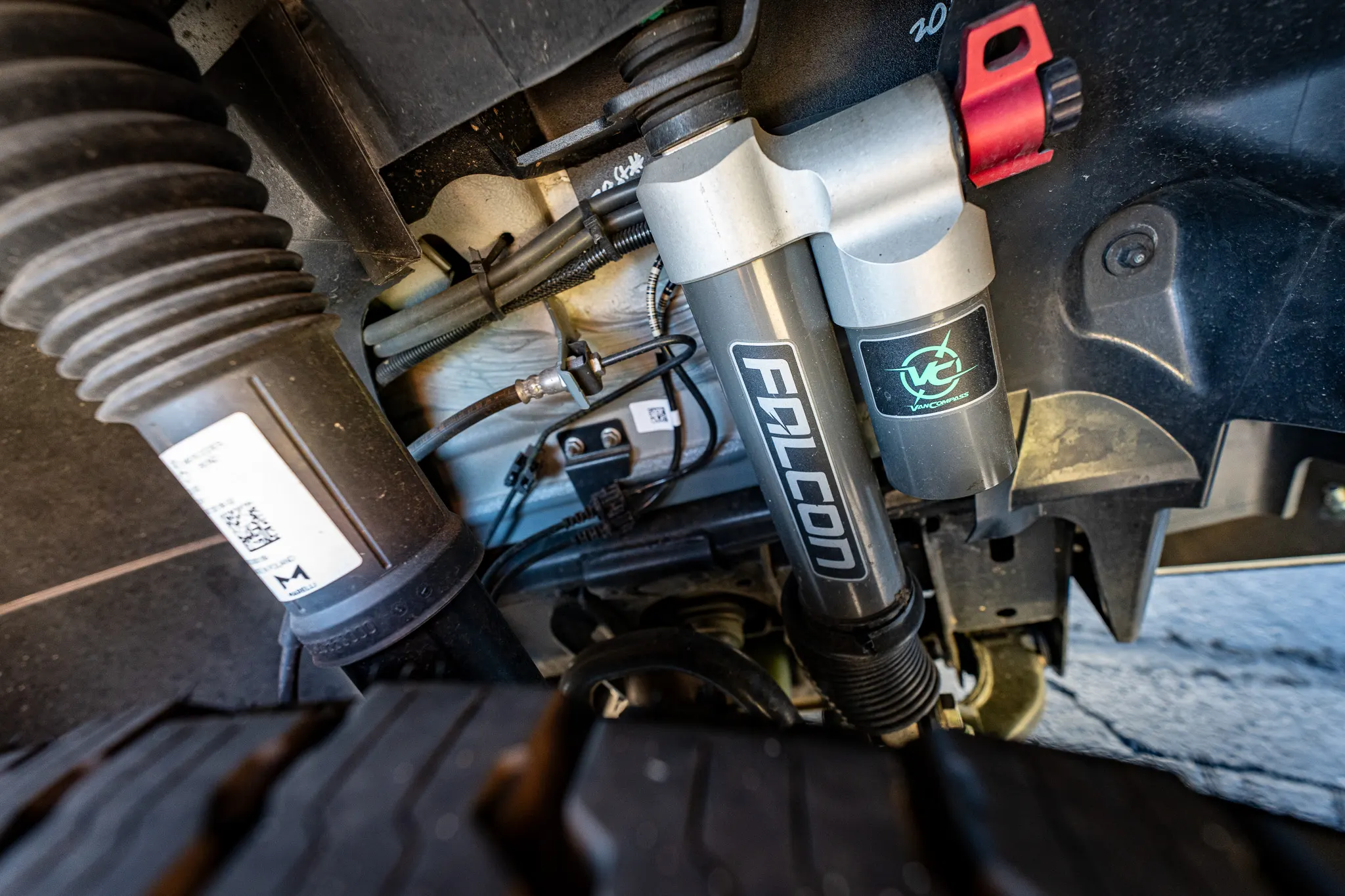 The Van Compass shock absorber behind the wheel