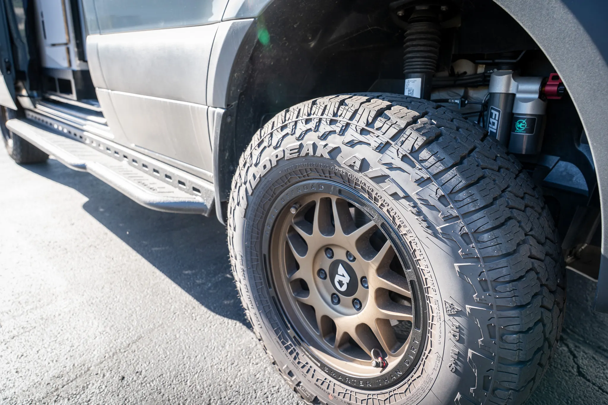 The front wheel and the lifted suspension, close up