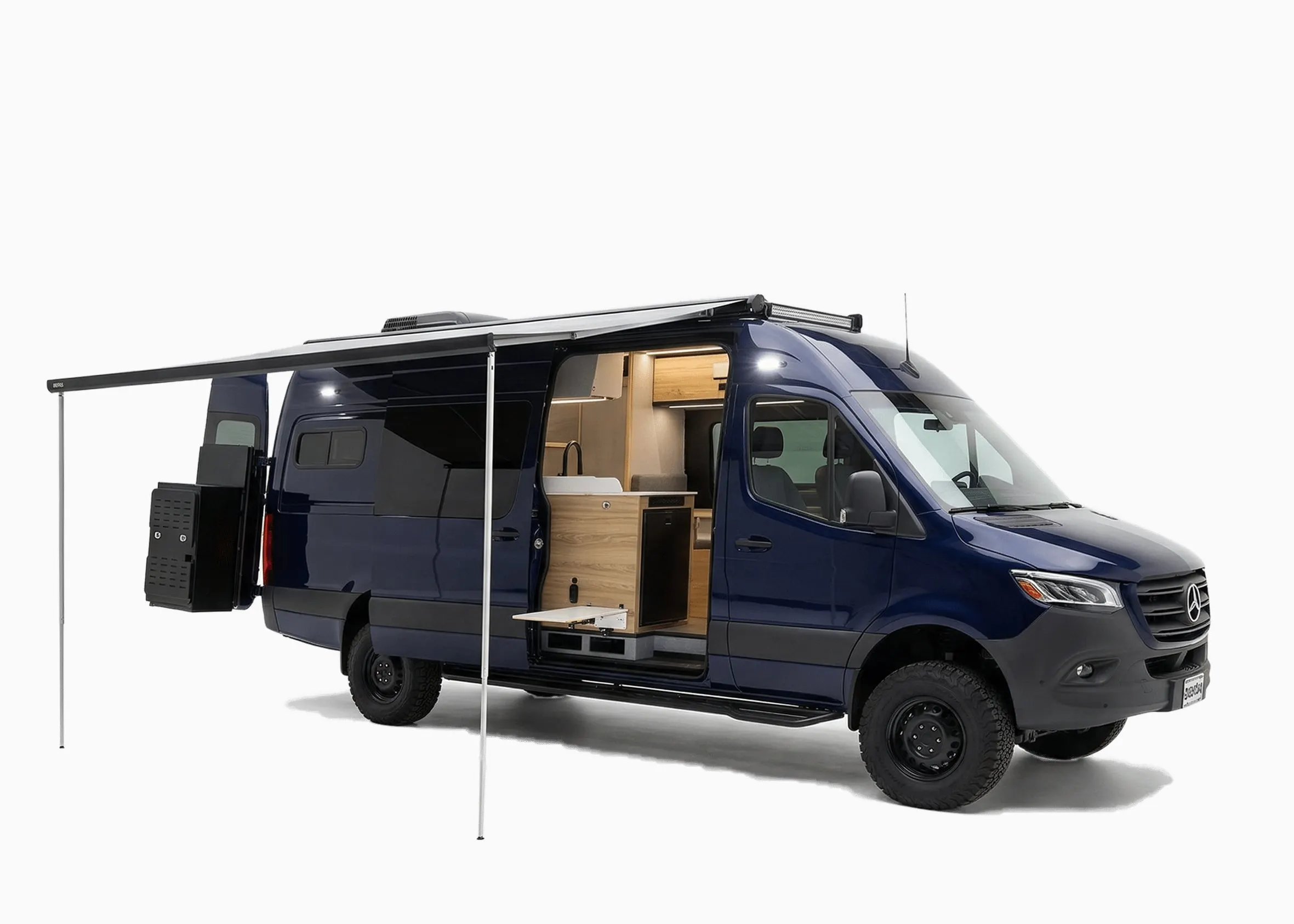 Front three-quarter view of the Parbat Core in dark blue, with the awning out